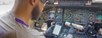 Aircraft Maintenance Technician in Cockpit using Flightdocs Mobile App for REVA